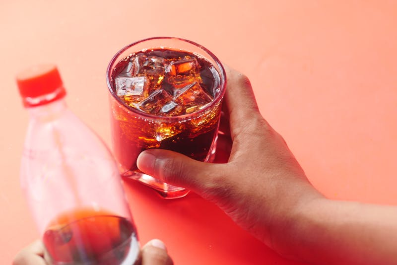 Fountain soda with ice and straw